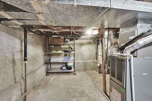 Unfinished basement with heating unit