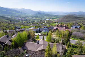Aerial view of residential area with a mountainous background