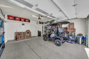Garage featuring a garage door opener
