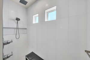 Bathroom with a tile shower