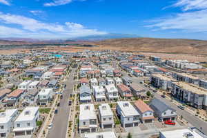 Aerial view of residential area featuring mountains