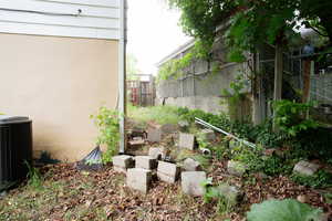 View of yard with central AC
