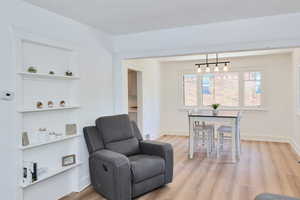 Livingroom Featuring new LVP floors and  fresh white paint