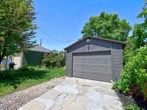 Detached garage featuring driveway