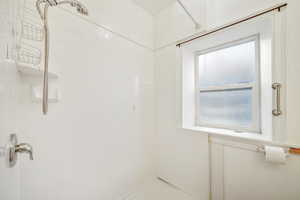 Bathroom featuring a standing shower