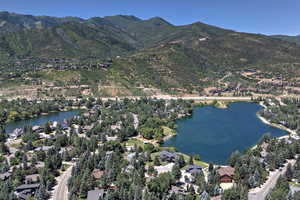 View of property location with a water and mountain view