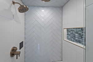 Bathroom view of a tile shower
