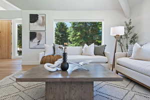 Living room featuring wood finished floors and baseboards
