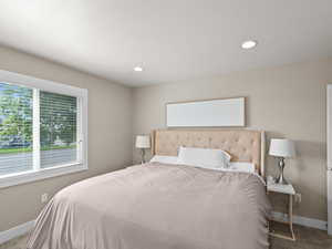 Bedroom with baseboards, carpet flooring, and recessed lighting