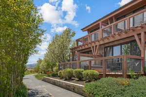 View of property exterior with a mountain view