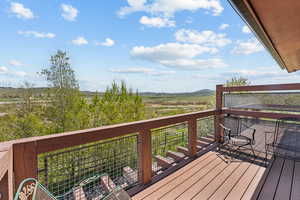 Wooden terrace with a view of countryside
