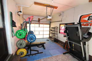 Workout room with a garage