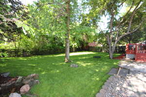 View of yard with a deck