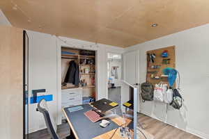 Office space with wood finished floors