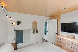 Bedroom featuring wood finished floors