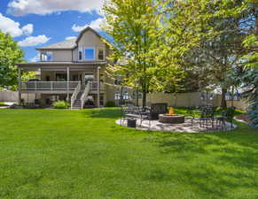 .46 acre lot with covered patio and covered deck.  Firepit patio and mature trees.