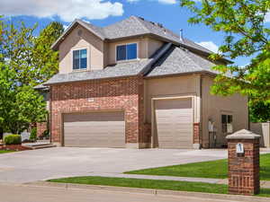 Luxury home on .46 acres with a 3 car garage, RV parking and park-like grounds