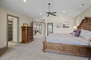 Primary bedroom features vaulted ceilings, spa style ensuite bathroom and walk in closet with custom organizers