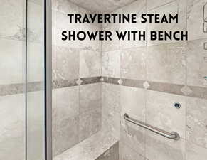 Travertine steam shower with bench