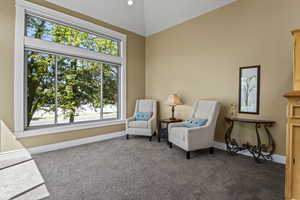 Formal living room with high ceilings and tons of natural light