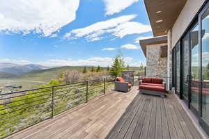 Wooden deck with a mountain view