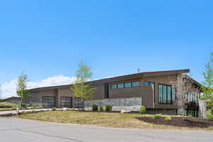 View of building exterior with a garage