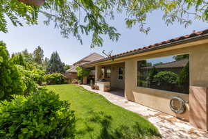 View of yard with a patio area