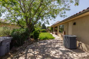 View of patio featuring central air condition unit