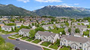 Aerial view of residential area featuring mountains
