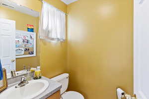 Bathroom with toilet and vanity