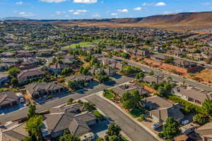 Aerial view of residential area with a mountainous background