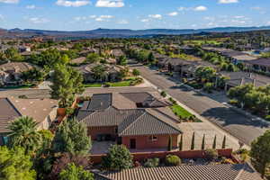 Aerial perspective of suburban area with a mountain backdrop