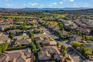 Aerial view of residential area with a mountainous background