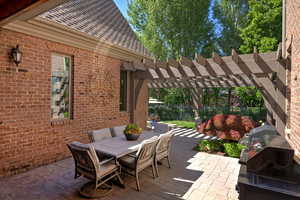 View of patio / terrace featuring outdoor dining space and a pergola