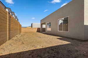View of fenced backyard