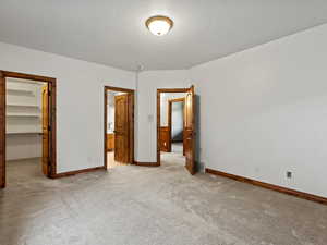Bedroom with a walk-in closet