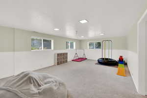 Playroom featuring carpet