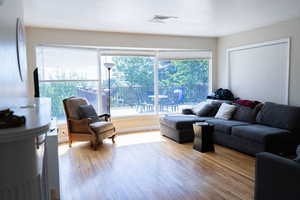Living area with wood finished floors