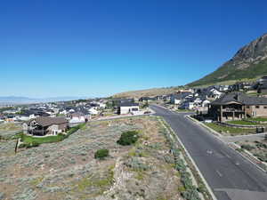 View of mountain backdrop with nearby suburban area