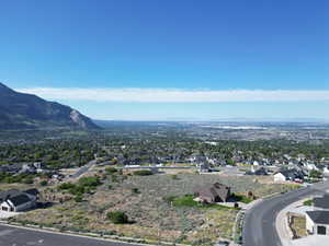 Aerial perspective of suburban area with a mountain backdrop