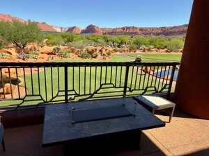View of patio / terrace featuring a mountain view and golf course view