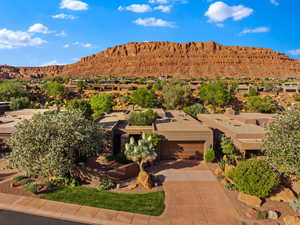 View of mountain background featuring nearby suburban area