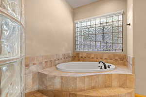 Bathroom featuring a garden tub