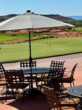 View of patio with view of golf course