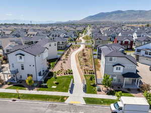 Aerial view of residential area featuring mountains Walking trails
