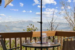Wooden terrace with a mountain view