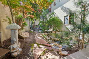 View of yard and waterfall