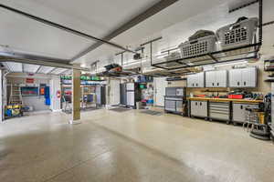 Garage featuring a garage door opener