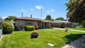 View of front of house featuring roof with shingles