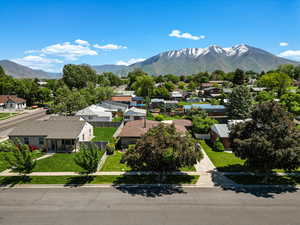 View of mountain background featuring nearby suburban area